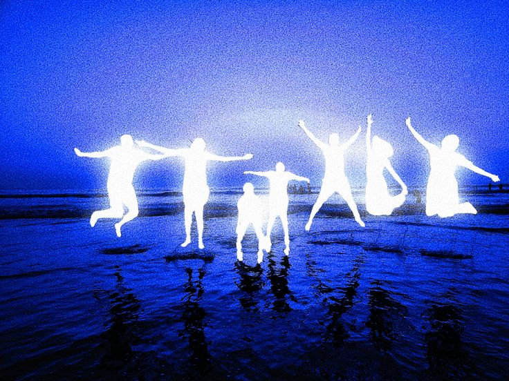 Glowing white silhouettes jumping above a deep blue shoreline