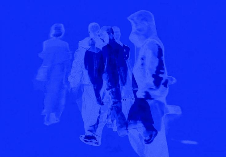 Blue-toned figures walking together